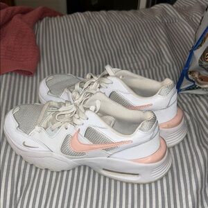 Nike White and Pink Sneakers with Modern Mesh Design